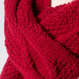 Soft red hand-knitted wool scarf