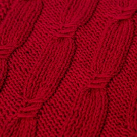 Hand-knitted red scarf made of high quality wool