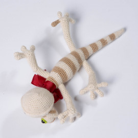 Lizard toy. Soft toy. Striped lizard for baby
