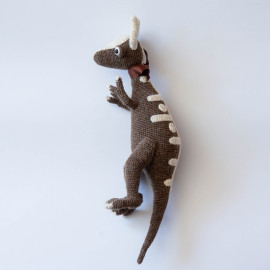 Dinosaur Toy. Soft toy for baby of the Jurassic period. Funny dino