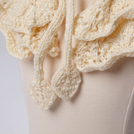 Openwork knit cape. Beige cape for the shoulders for the girl.