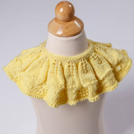 Round cape on the shoulders. Cotton cape knitted by hand