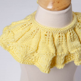 Round cape on the shoulders. Cotton cape knitted by hand