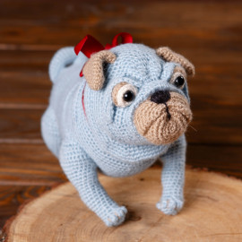 Toy dog. Toy pug. A dog is the best gift for a child